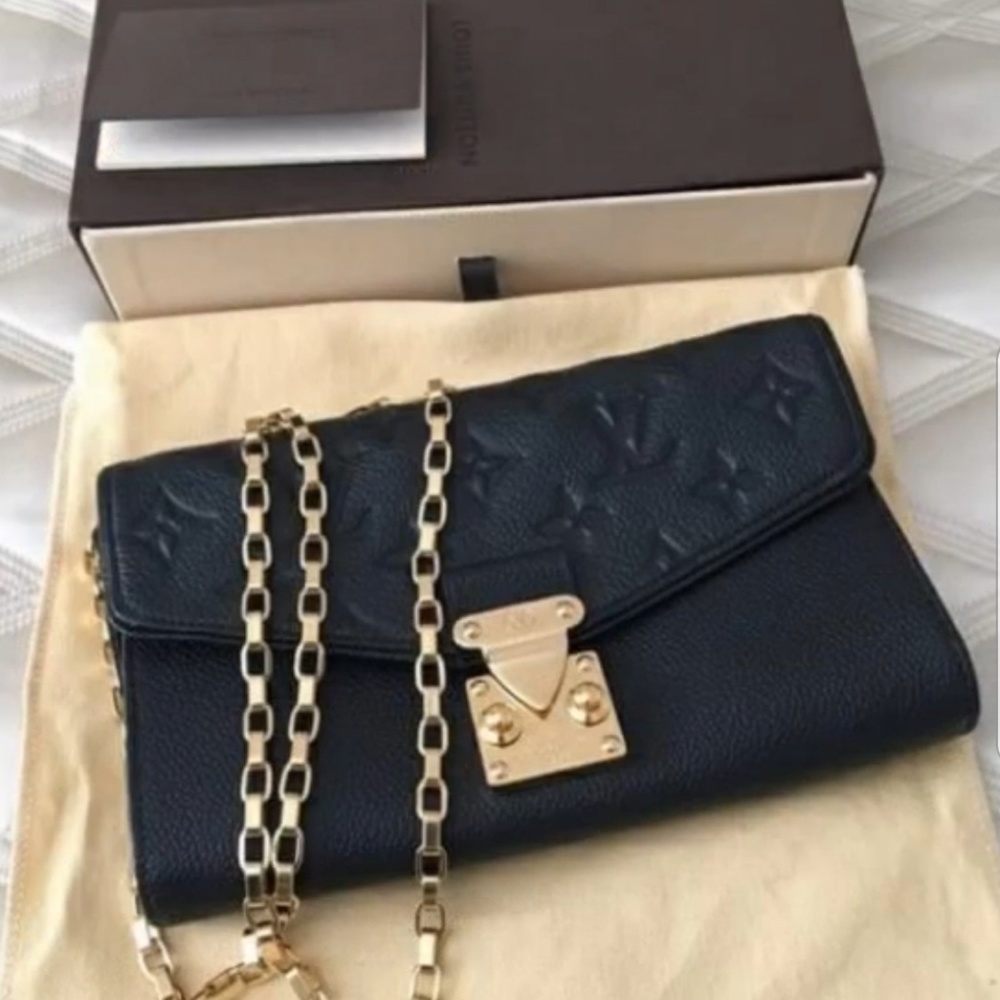 LOUIS VUITTON ST GERMAIN POCHETTE EMPREINTE